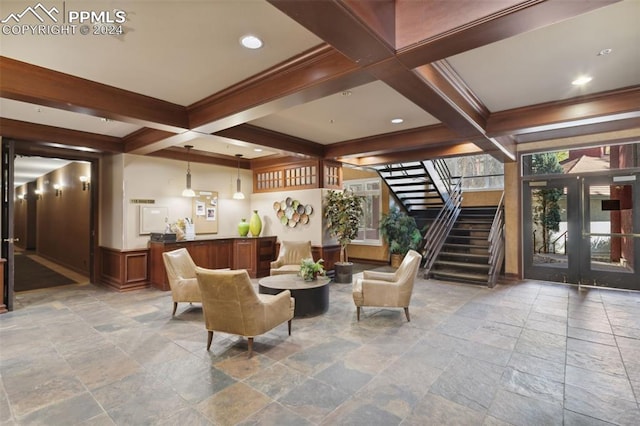 175 W Cheyenne Rd Unit 214, Colorado Springs, CO 80906 - community lobby featuring beamed ceiling, stairs, coffered ceiling, a wainscoted wall, and crown molding