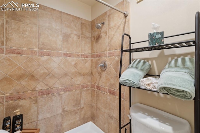 175 W Cheyenne Rd Unit 214, Colorado Springs, CO 80906 - full bathroom featuring tiled shower and toilet