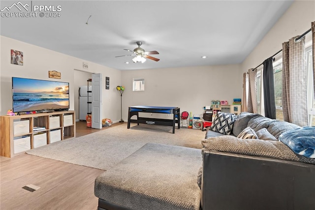 living room featuring ceiling fan