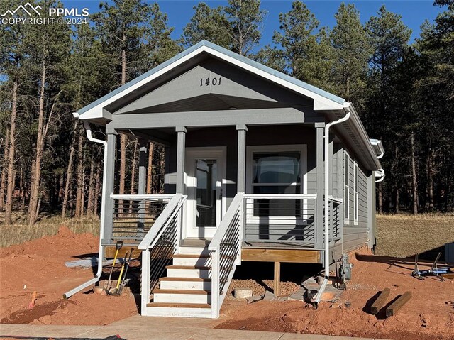 view of front facade featuring covered porch