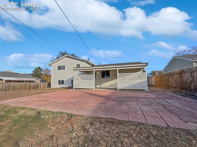 rear view of property with a patio