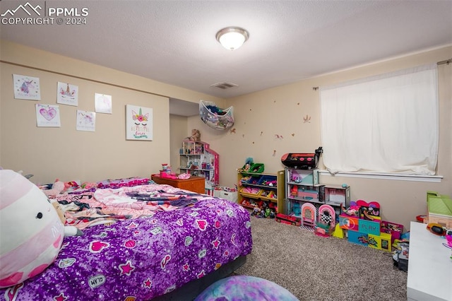 bedroom featuring carpet