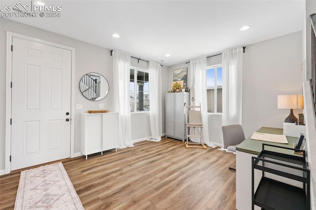 office area with hardwood / wood-style flooring