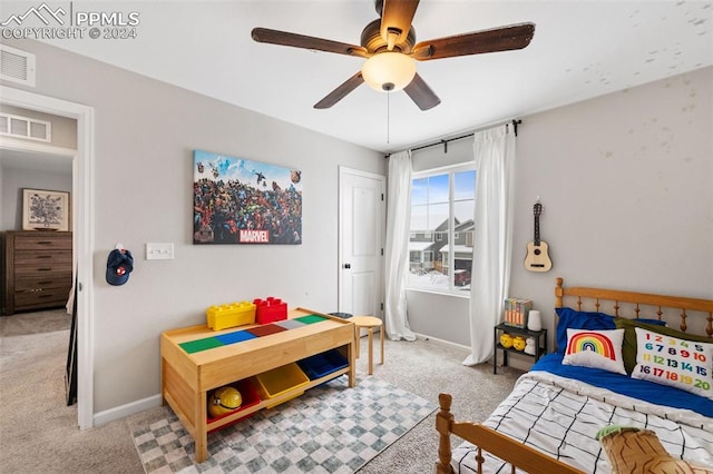 bedroom featuring light carpet and ceiling fan