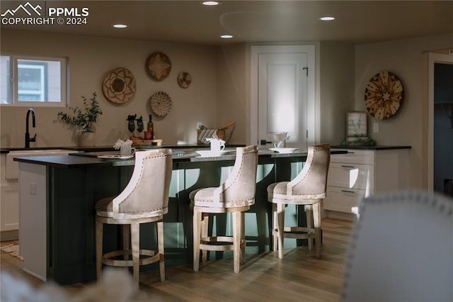 dining room with light hardwood / wood-style floors