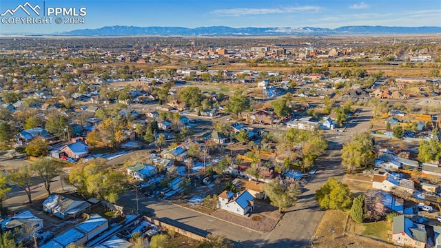 drone / aerial view featuring a mountain view