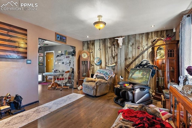 interior space featuring wooden walls and hardwood / wood-style flooring