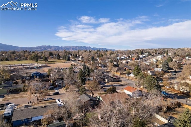 birds eye view of property featuring a mountain view