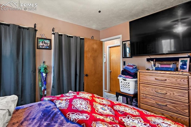 bedroom with a textured ceiling