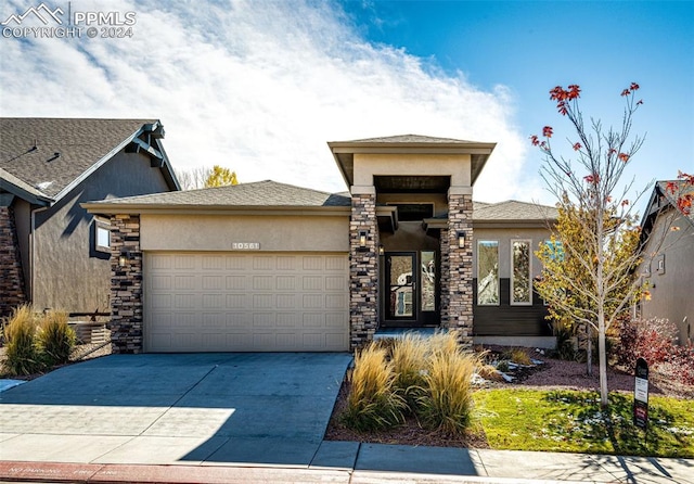 prairie-style house with a garage