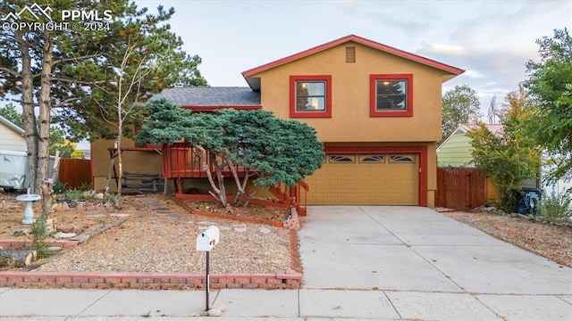 view of front of property featuring a garage