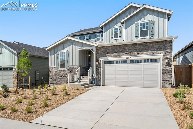 craftsman house featuring a garage