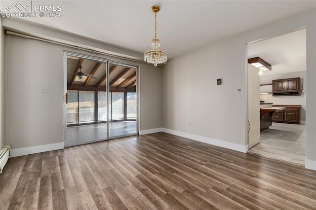 unfurnished room with beamed ceiling, hardwood / wood-style flooring, and ceiling fan with notable chandelier