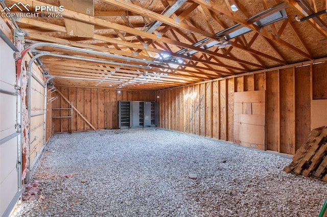 miscellaneous room featuring lofted ceiling