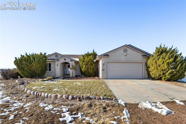 ranch-style house with a garage