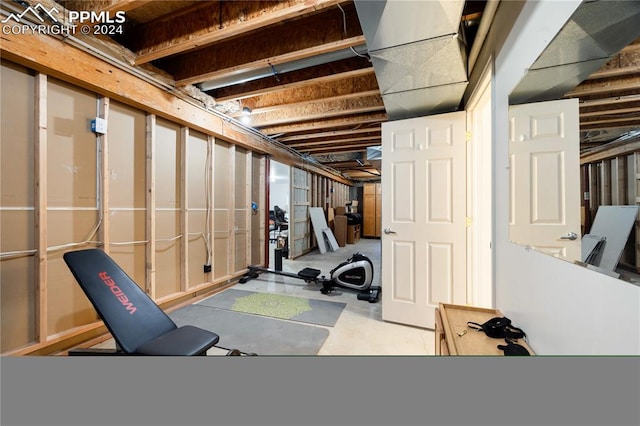 workout room with concrete flooring