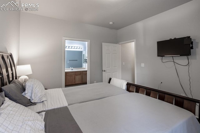 bedroom featuring ensuite bath