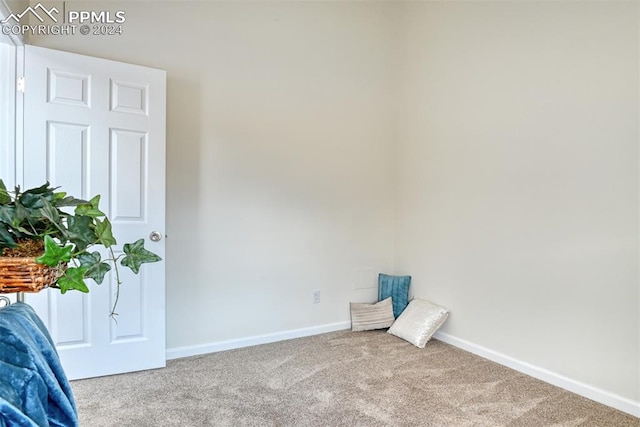 spare room featuring carpet flooring