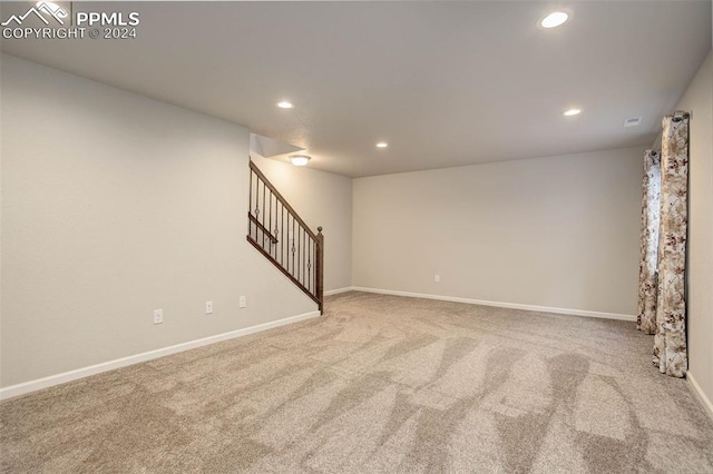 basement with carpet flooring