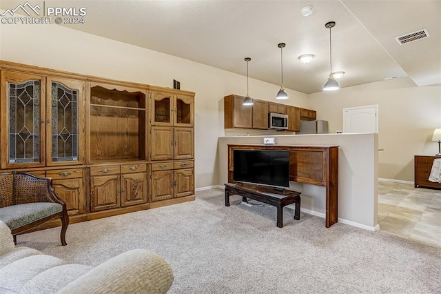 living room featuring light colored carpet