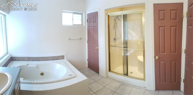 bathroom featuring vanity, tile patterned floors, and independent shower and bath