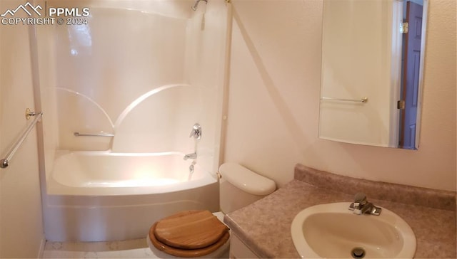 full bathroom featuring vanity, tub / shower combination, and toilet