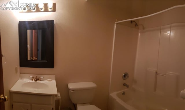 full bathroom featuring shower / tub combination, vanity, and toilet