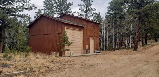 view of outdoor structure with a garage