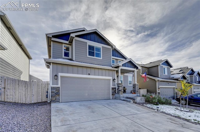 craftsman house with a garage