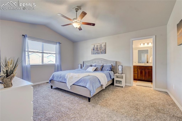 carpeted bedroom with lofted ceiling, ceiling fan, and ensuite bathroom