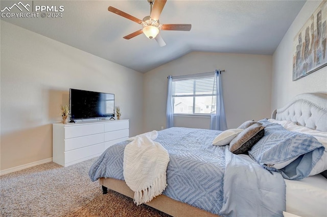 bedroom featuring carpet, lofted ceiling, and ceiling fan