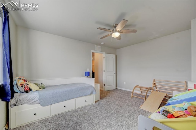 carpeted bedroom with ceiling fan