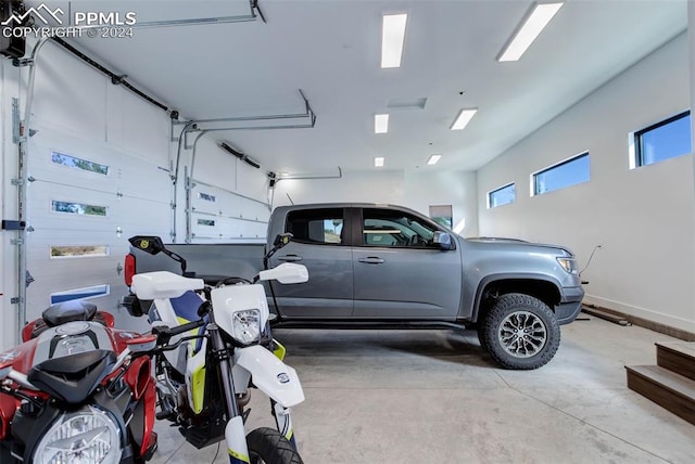 garage featuring baseboards