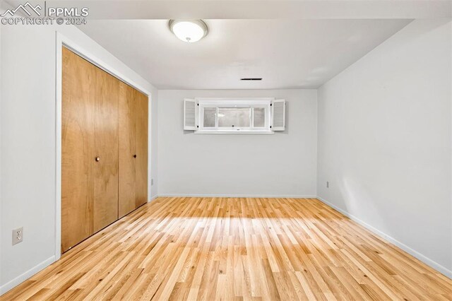 spare room featuring hardwood / wood-style flooring