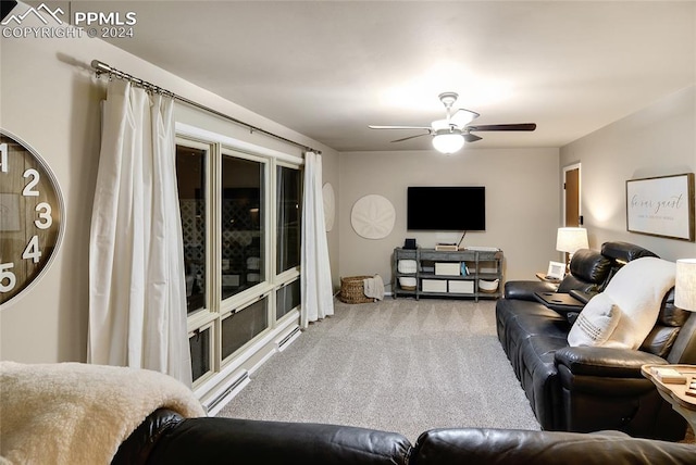 carpeted living room with ceiling fan