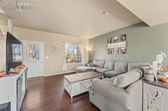 living room with dark wood-type flooring