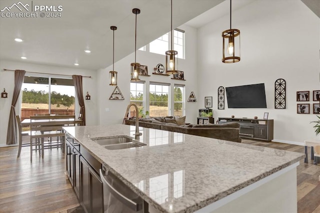 kitchen with pendant lighting, sink, and a healthy amount of sunlight