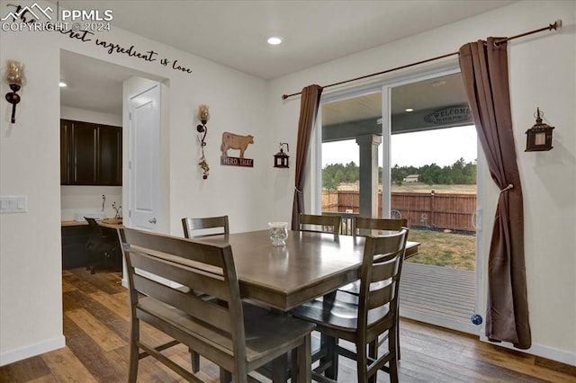 dining area featuring hardwood / wood-style flooring