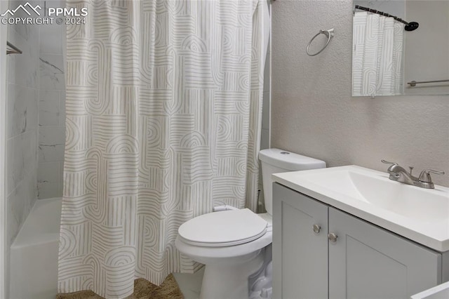 full bathroom with vanity, toilet, and shower / tub combo