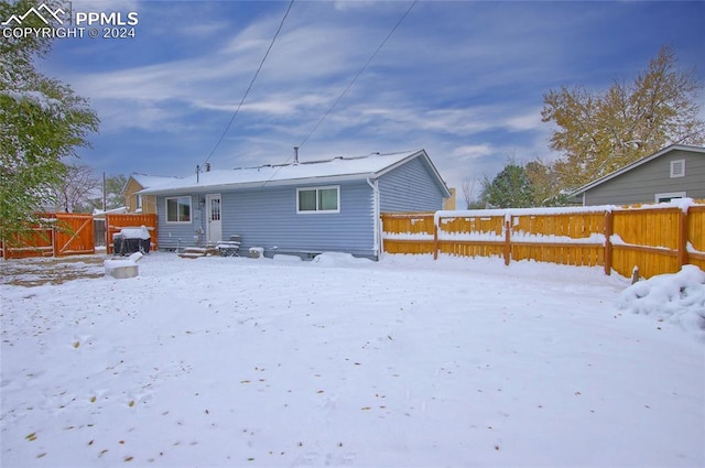 view of snow covered property