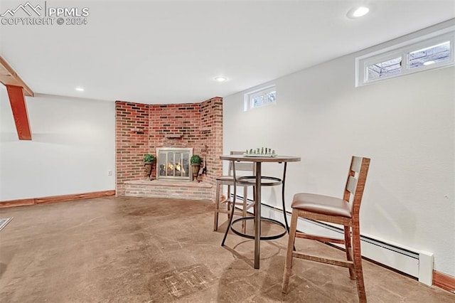 dining space with a fireplace