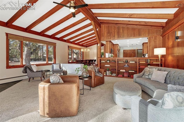 living room with carpet, lofted ceiling with beams, wood walls, and a baseboard radiator