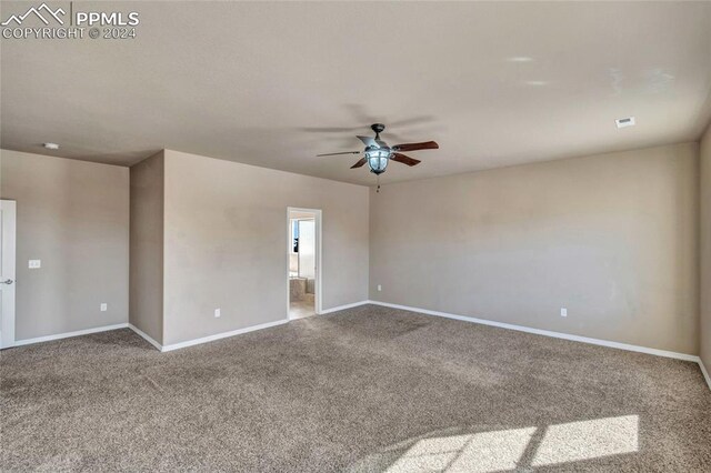 carpeted empty room with ceiling fan