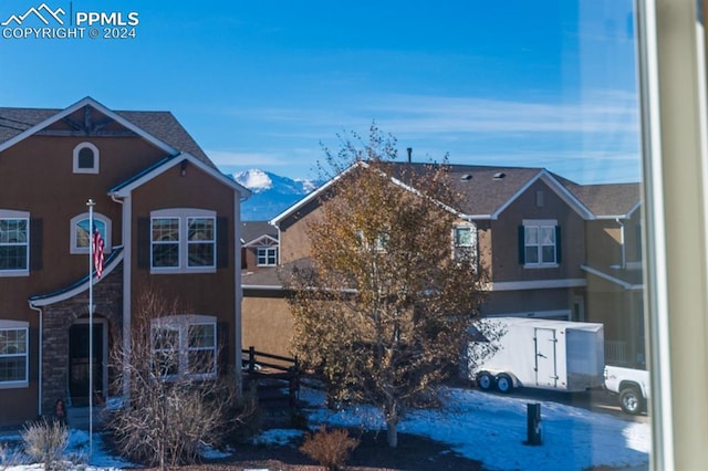 exterior space featuring a mountain view