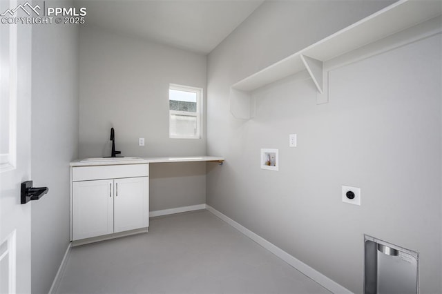 clothes washing area featuring cabinets, washer hookup, electric dryer hookup, and sink