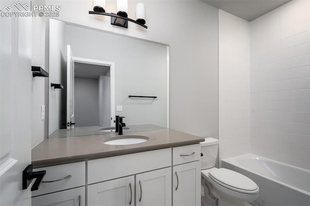 full bathroom with washtub / shower combination, vanity, and toilet