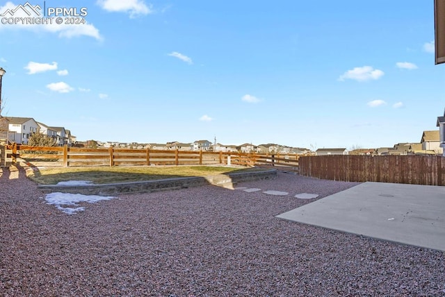 view of yard with a patio area