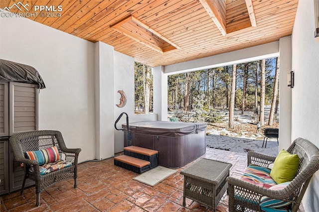 view of patio featuring a hot tub