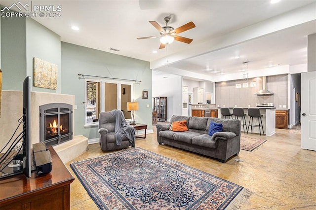 living room featuring ceiling fan