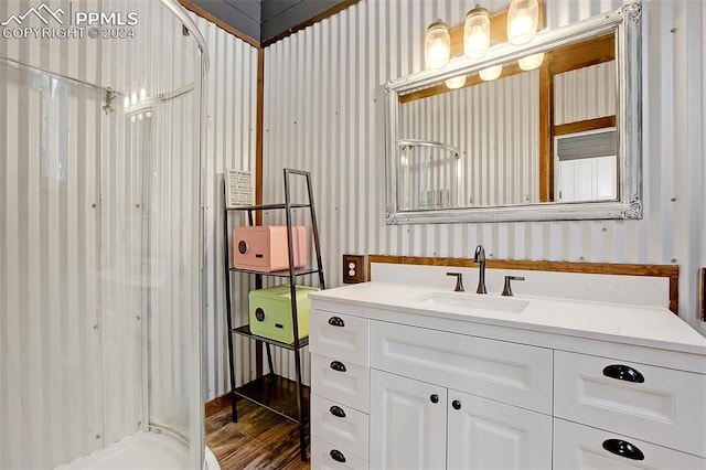 bathroom featuring vanity and wood-type flooring